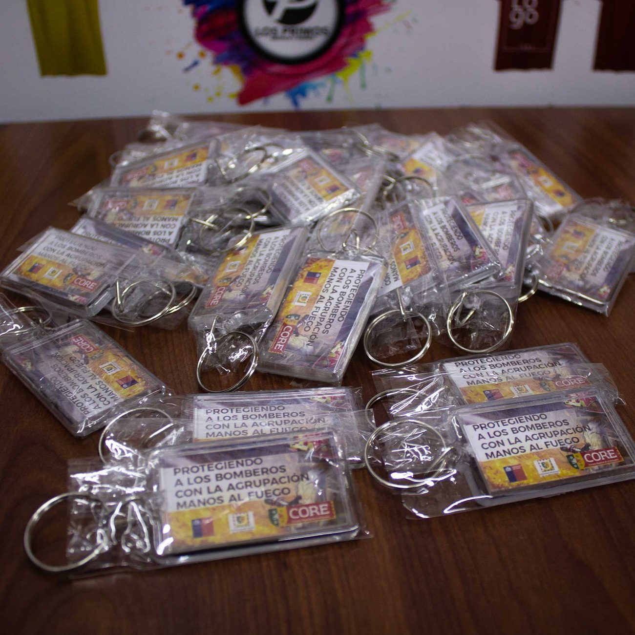 Producción de llaveros para campaña de difusión